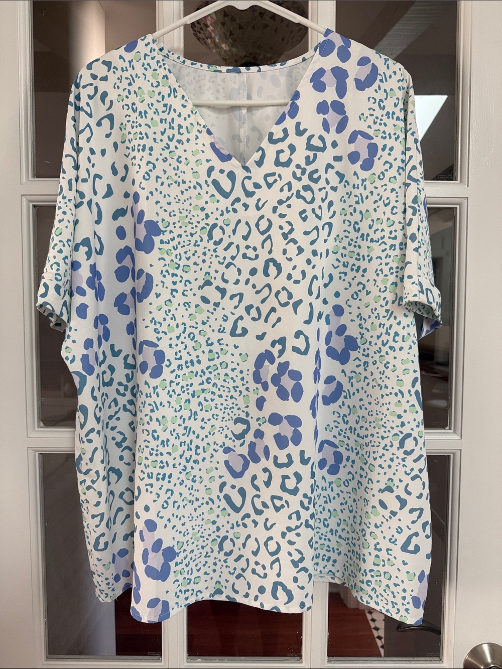 Women's V-Neck Top - White with Blue & Aqua animal print. Silky fabric.